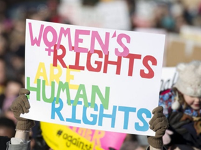 Protest sign being held up that says"Women's Rights are Human Rights"