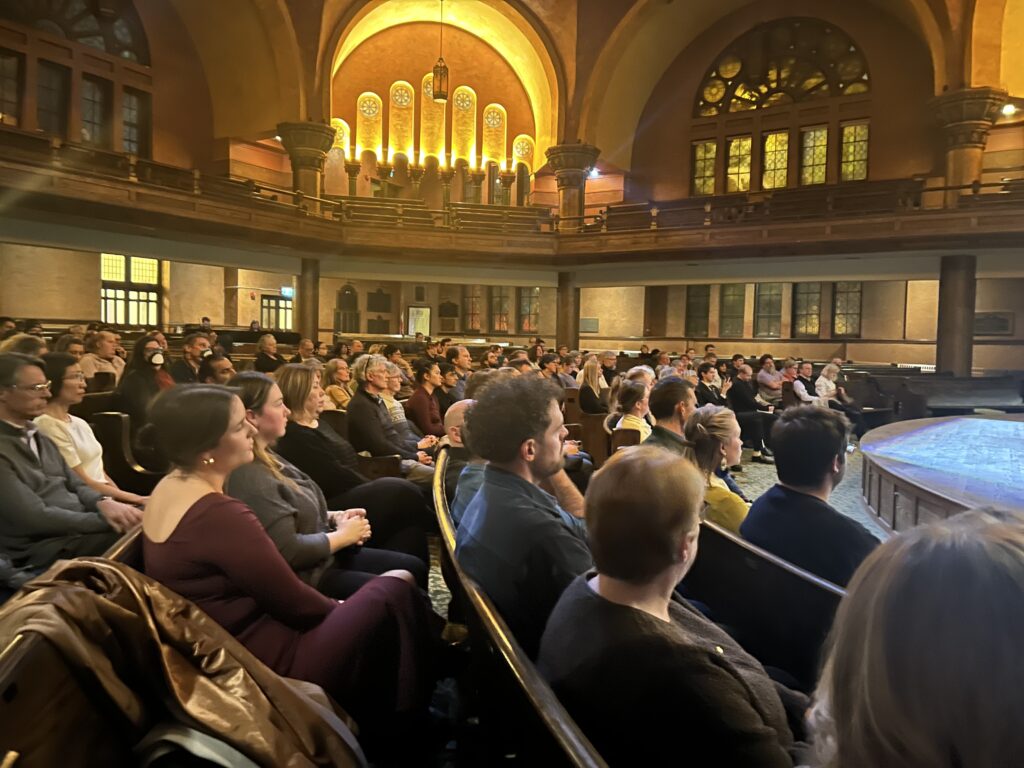 audience members seated