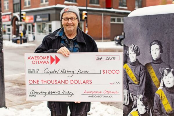 David Dean holding large cheque