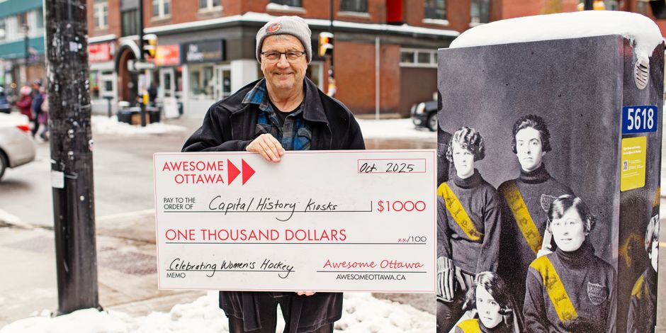 David Dean holding large cheque