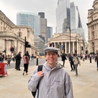 Nicholas Langer standing outside in front of buildings