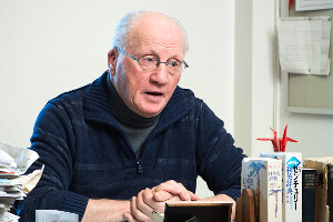 Jacob Kovalio seated at desk