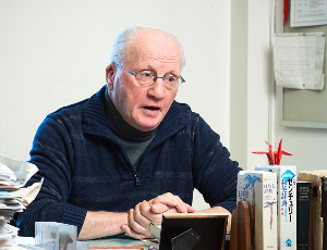 Jacob Kovalio seated at desk