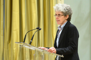 Professor Dominique Marshall speaking at a podium