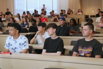 Students listening to a presentation at the Sprosh Case Crack.