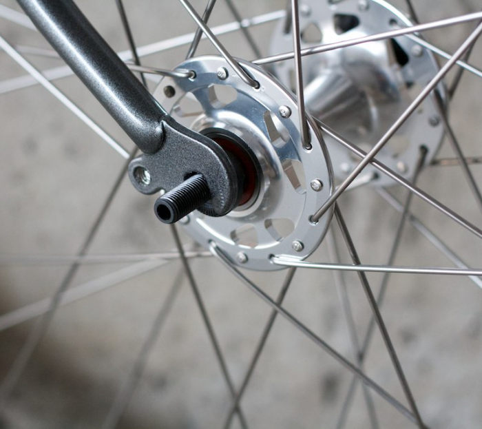 A closeup of a bike hub.