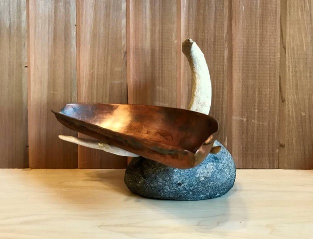 Qulliq - traditional oil lamp used by the Inuit