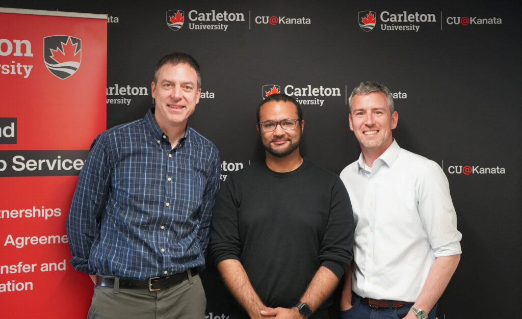 Professors James Green (left) and Kyle Biggar (right), along with PhD student François Charih (center)