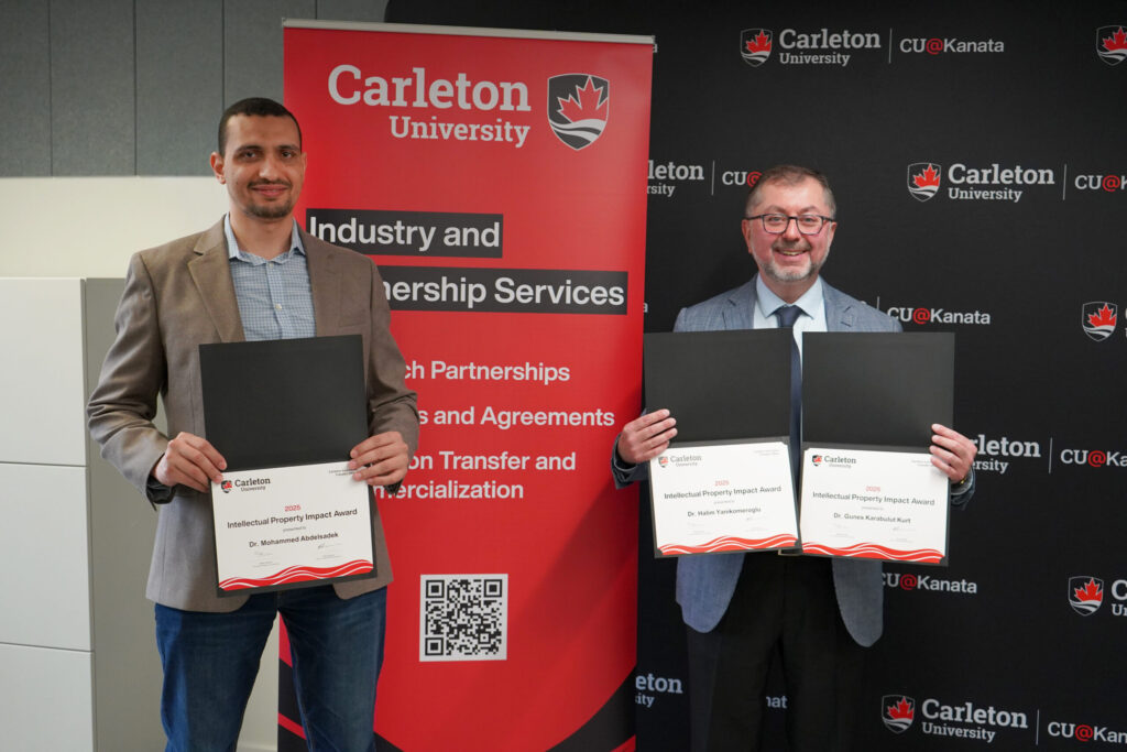 Mohammed Abdelsadek and Prof. Halim Yanikomeroglu display their IP Impact Award certificates
