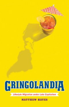 The cover of the book shows a graphic of a cocktail casting a shadow of North, Central and South America