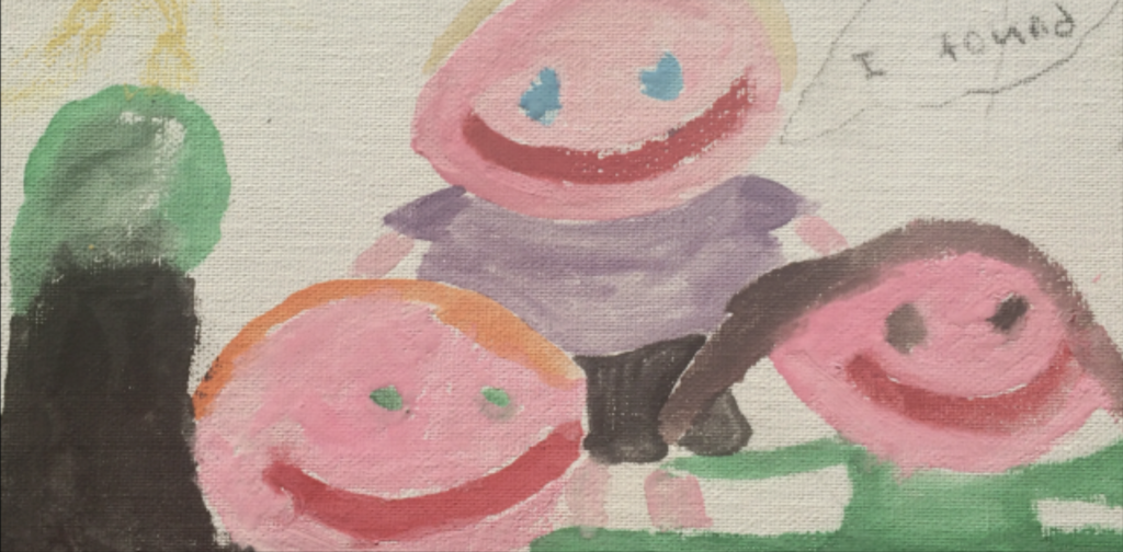 Painting of 3 happy faces.