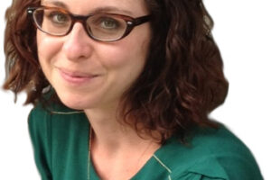 Profile photo of Nadine Blumer, wearing a green shirt