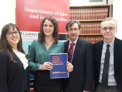 Group photo of Prof. Douglas, Carly Jacuk, Dean Plourde, and Prof. Saunders 