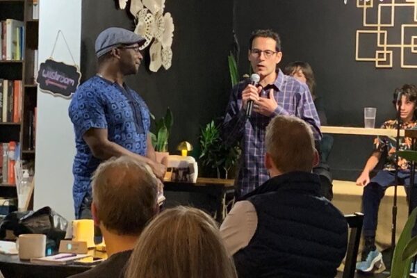 Image of Philip Kaisary speaking to an audience at the event.