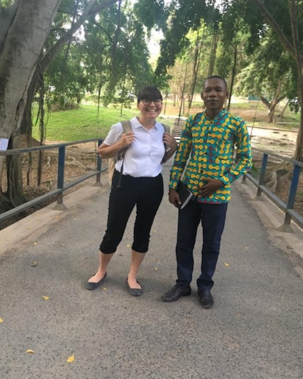 Stefanie and Leonard standing side by side outside