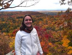 Antonia looking out over Gatineau Park in autumn