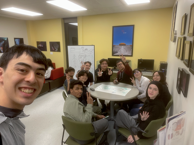 Group of students seated at a table for the Japanese Conversation Group