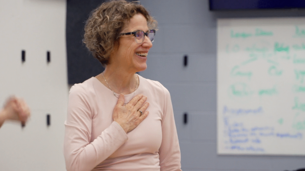 Peggy observes her students in the VR lab.