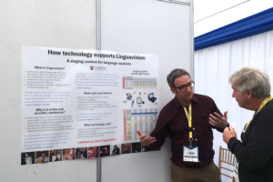 Mike discusses his poster with Dr. Phil Hubbard (Stanford)