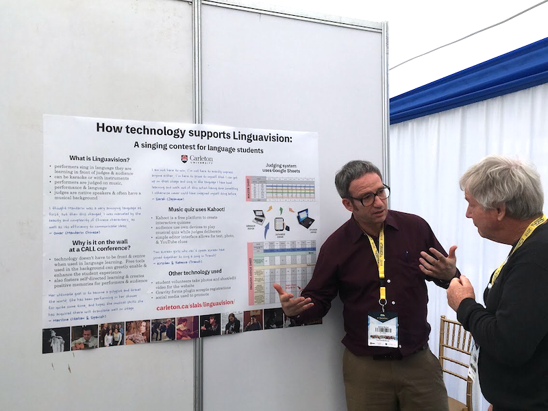 Mike discusses his poster with Dr. Phil Hubbard (Stanford)