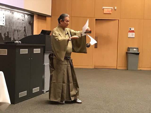 Mr. Hayashiya demonstrates paper cutting