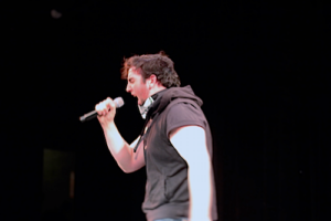 Charles sings on the stage