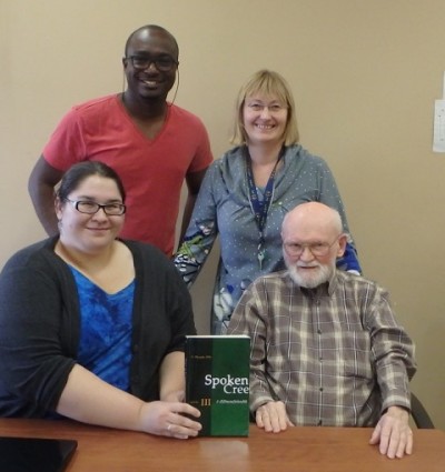 Research team with the book