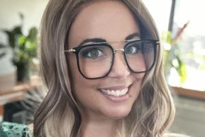 Lindsay smiles at the camera