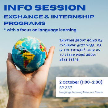 Info session times. Hand holding globe against blurry background.