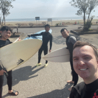 Scott and friends on the beach in Japan