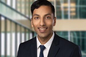 Jabir in a suit and tie.