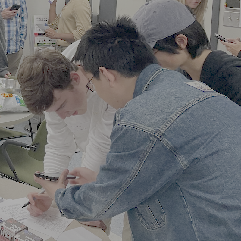 Han shows Simon answer on his phone.