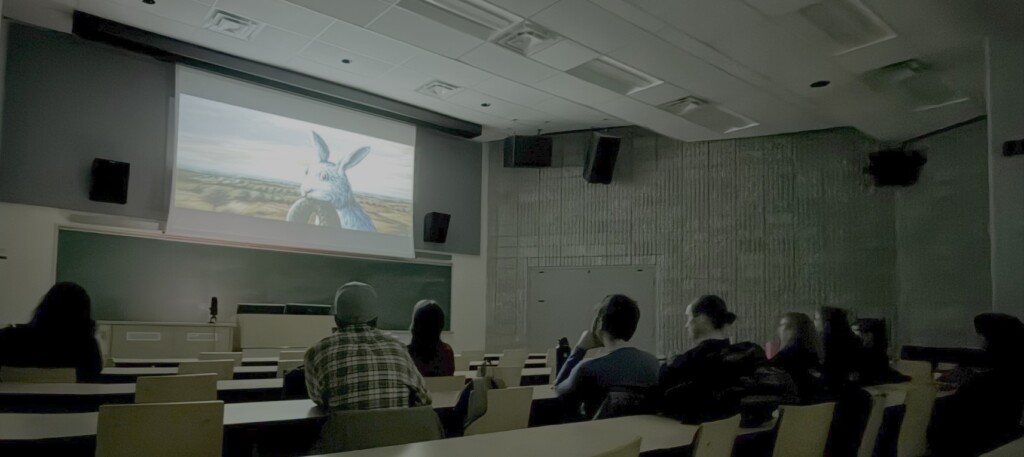 Group of students watching a movie