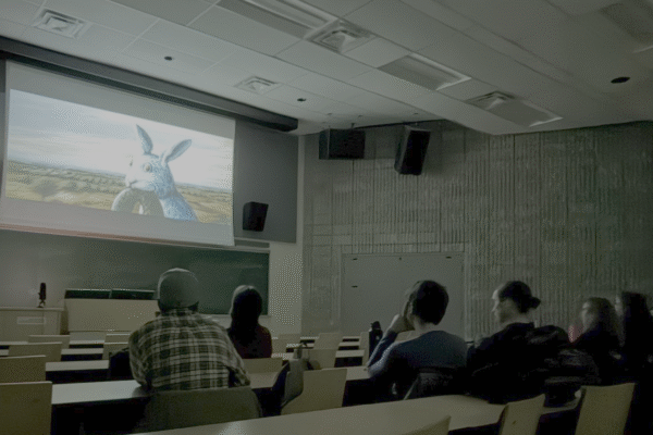 Group of students watching a movie