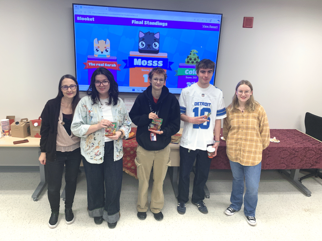 Prize winners shown against a backdrop of the app.