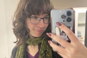 Margo smiles for her phone