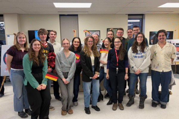 Group of students pose for camera
