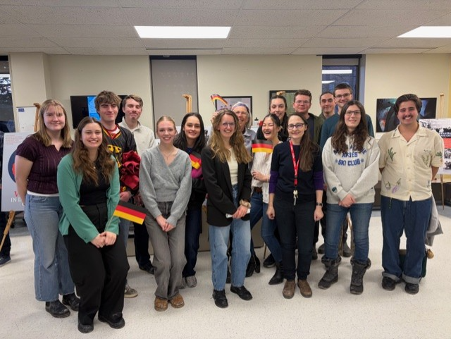 Group of students pose for camera