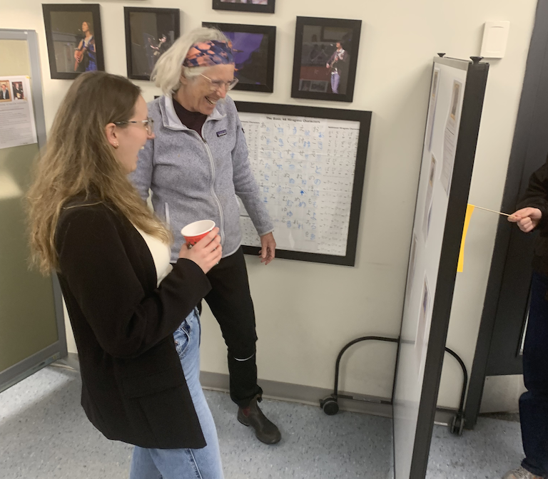 Professor Bose and Klara Heuberger look at student posters