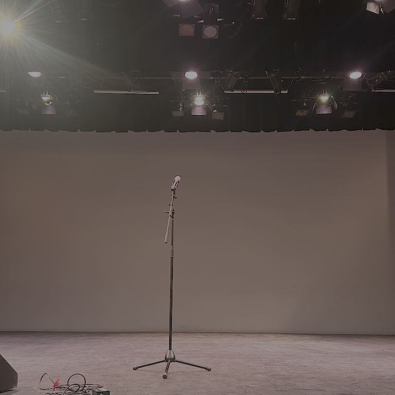 Microphone on an empty stage.