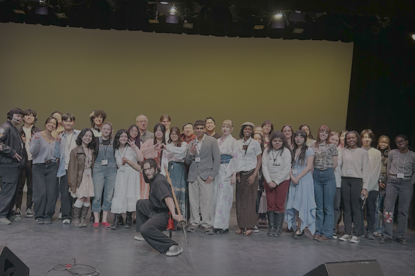 All performers in a group on the stage