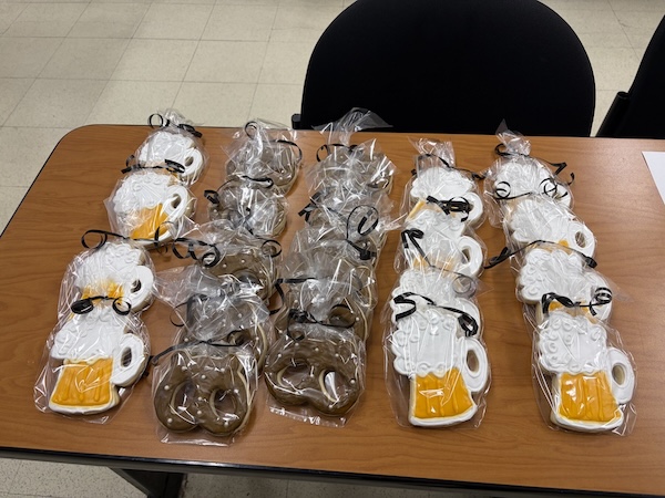 Cookies in the shape of pretzels and beer steins.  
