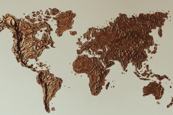 Brown textured map of the world.