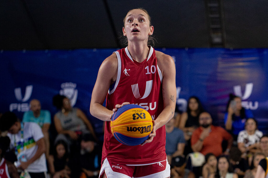 A basketball players prepares to take a free throw during a 2025 FISU 3x3 Basketball University World Cup game.
