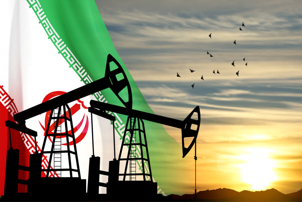 Silhouette of Oil pump on background of flag of Iran against the sunset or sunrise
