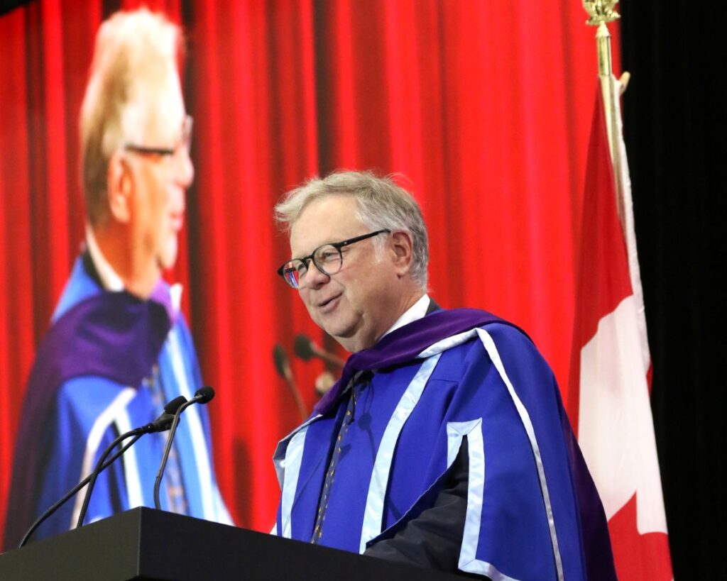 Bruce Lourie speaks at convocation after receiving his honorary degree.