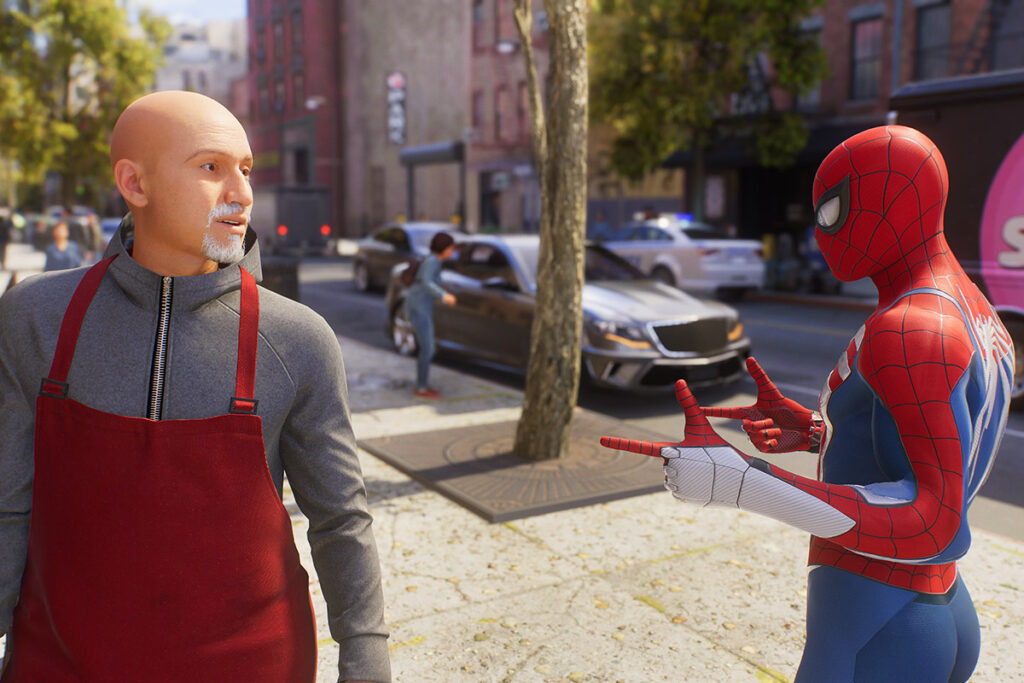 A still from a video game, Spider-Man pointing at a shopkeeper.