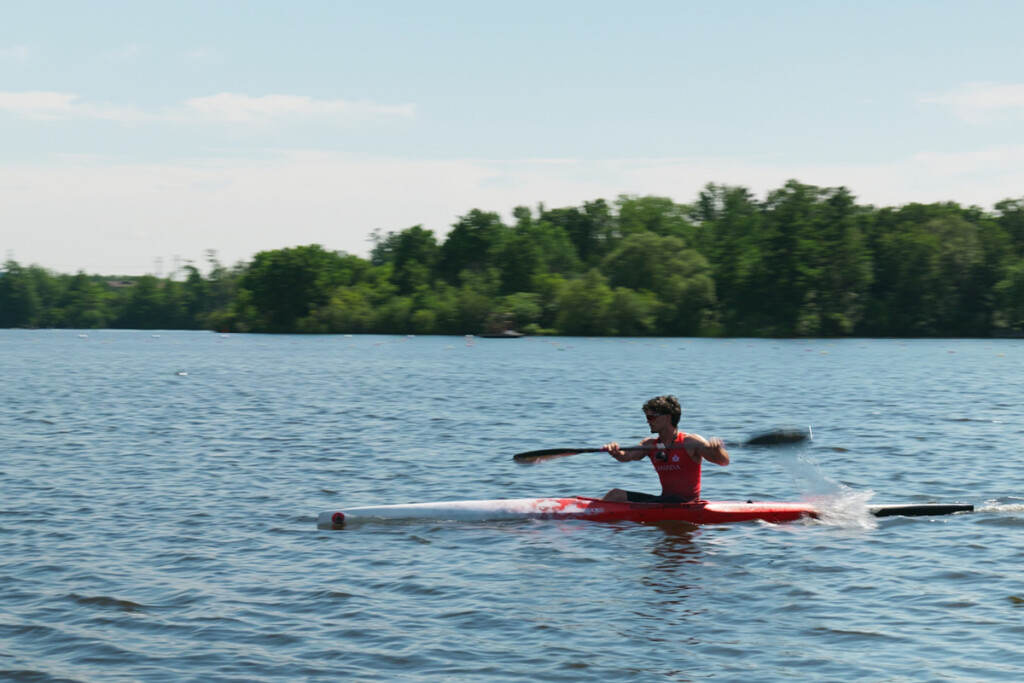 A kayaker on a lake.