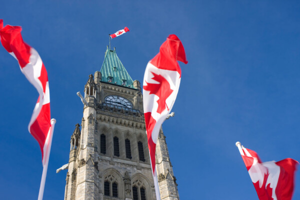 Parliament of Canada, Peace Tower, Canadian Flags.