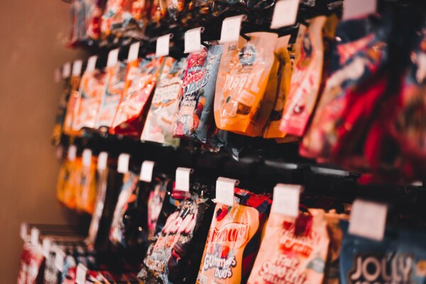 Various snacks on display inside a store.